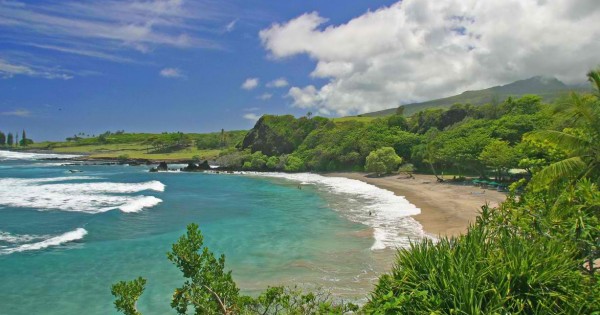 Secluded Hamoa Beach surrounded by lush vegetation