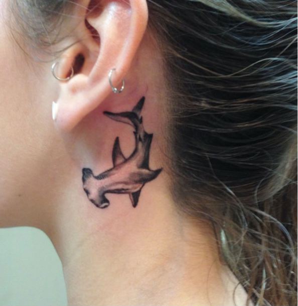Bizaare Laws in Hawaii - Behind the ear tattoo